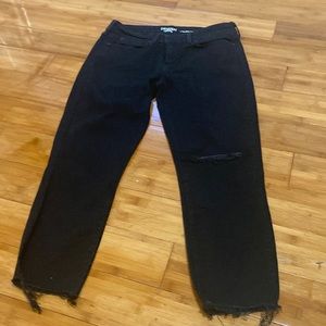 Women’s ripped and distressed Levi’s jeans